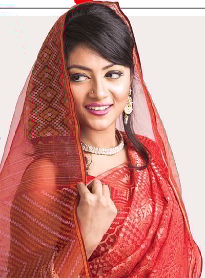 প্রতীকী এ ছবিটির মডেল: আইরিন, ছবি: কিবর হোসেন, কৃতজ্ঞতা: টাঙ্গাইল শাড়ি কুটির