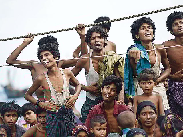 ১৪ মে, ২০১৫: আন্দামান সাগরে ভাসমান হতভাগ্য মানুষ। ছবি: এএফপি