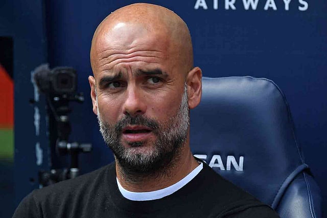 বার্সার কোচ থাকতে রোনালদোকে ভালোই ভুগিয়েছেন গার্দিওলা। ছবি: এএফপি