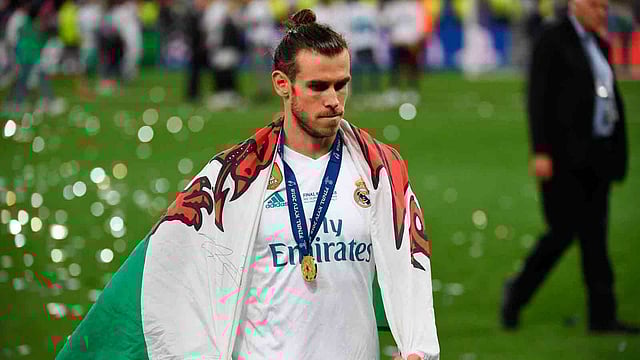 চ্যাম্পিয়ন হয়েও বেলের মুখ ভার। চটেছেন জিদানের ওপর। ছবি: এএফপি