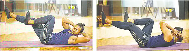 হাত মাথার নিচে রাখুন। পা ভাঁজ করে ওপরে তুলুন। এবার মাথা ওপরে তুলে বাঁ হাতের কনুই দিয়ে ডান পা ছোঁয়ার চেষ্টা করুন। একইভাবে ডান কনুই দিয়ে বাঁ পাশের পায়ে ছোঁয়াতে হবে। এভাবে ৩০ বার করুন।