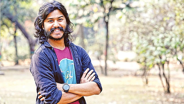 কার্টুনিস্ট আবদুল্লাহ আল মোরশেদ।