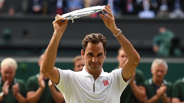 রানারআপ শিরোপায় নিশ্চয়ই সন্তুষ্ট নন ফেদেরার? ছবি: এএফপি