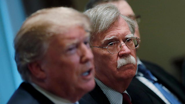 ডোনাল্ড ট্রাম্প ও জন বোল্টন। ছবি: রয়টার্স