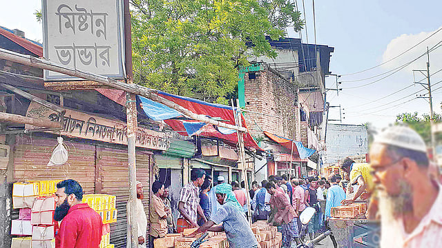 নাটোর শহরের প্রাণকেন্দ্রে অর্ধশত বছরের ঐতিহ্যবাহী নিমতলা দধি ও মিষ্টান্ন ভান্ডার বন্ধ করে দেওয়া হচ্ছে। গতকাল দুপুরে। ছবি: প্রথম আলো