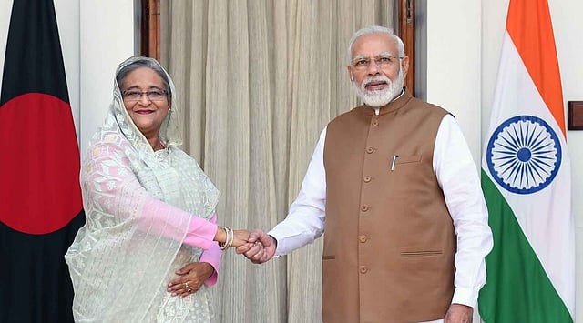 বাংলাদেশের প্রধানমন্ত্রী শেখ হাসিনা ও ভারতের প্রধানমন্ত্রী নরেন্দ্র মোদি নয়াদিল্লিতে বৈঠক করেন। ছবি: এএফপি