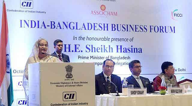 প্রধানমন্ত্রী শেখ হাসিনা নয়াদিল্লিতে আইসিটি মৌর্য হোটেলের কামাল মহল হলে আইবিবিএফের উদ্বোধনী অধিবেশনে বক্তব্য দেন। ভারত, ০৪ অক্টোবর। ছবি: পিআইডি