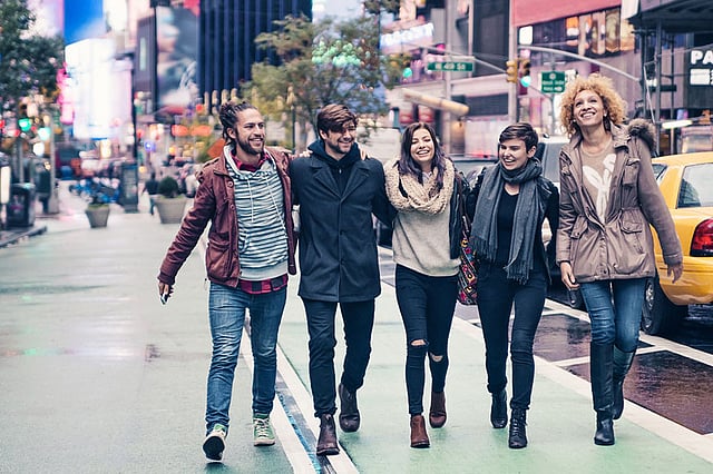 বন্ধুত্ব, স্নেহ-ভালোবাসা ও অর্জনে অনাবিল সুখ পায় মানুষ। ছবি: এএফপি