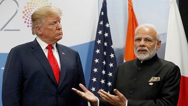 মার্কিন প্রেসিডেন্ট ডোনাল্ড ট্রাম্প ও ভারতের প্রধানমন্ত্রী নরেন্দ্র মোদি। ছবি: রয়টার্স