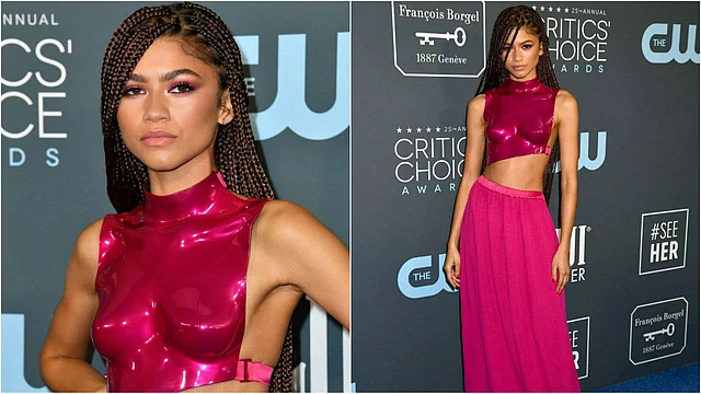 ভাইব্রেন্ট পিংক আউটফিটে জেনজি তারকা অভিনেত্রী জেন্ডায়া। মার্কিন ব্র্যান্ড টম ফোর্ডের এই পোশাকটির মূল আকর্ষণ হাইনেক ব্রেস্টপ্লেট। সঙ্গে জুটি হয়েছে একই রঙের ফ্লোর ছোঁয়া স্কার্ট। রেড কার্পেটে তাঁর এই লুকটি ফ্যাশন জগতে ব্যাপক প্রশংসা পেয়েছিল