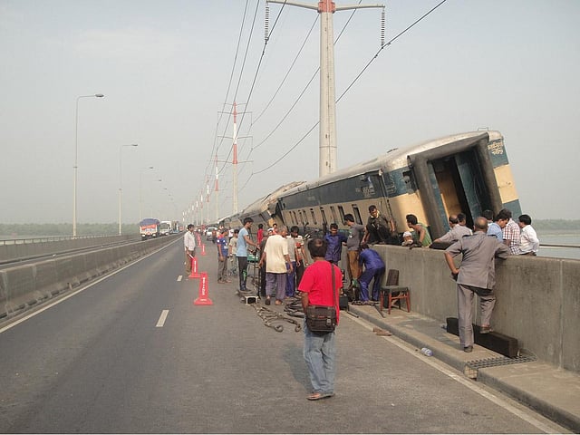Nine compartments of an inter-city Dinajpur-bound train to Dhaka derailed on Bangabandhu Bridge on Sunday night. Photo: Prothom Alo