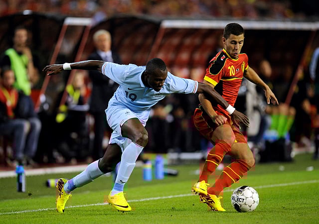 France's midfielder Josuha Guilavogui (L) and Belgium's midfielder Eden Hazard vie for the ball during the 2014 World Cup friendly football match between Belgium and France at the King Baudouin stadium in Brussels on August 14, 2013. AFP