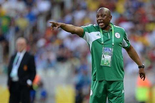 Nigeria's coach Stephen Keshi gives instruction during the FIFA Confederations Cup Brazil 2013 Group B football match against Spain, at the Castelao Stadium in Fortaleza on June 23, 2013. AFP