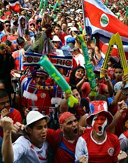 Costa Rican fans react as they watch the Brazil 2014 FIFA World Cup football match against Netherlands on a giant screen at Democracy Square in San Jose on July 05, 2014. AFP