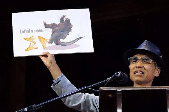 Kiyoshi Mabuchi of Japan accepts the Physics Prize for his study 'Frictional Coefficient under Banana Skin' at the 24th First Annual Ig Nobel Prizes awards ceremony at Harvard University in Cambridge, Massachusetts September 18, 2014. Photo: Reuters