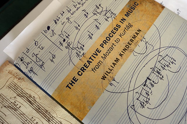 an original fragment of Wolfgang Amadeus Mozart’s Sonata in A major, K 331 keynotes (L) next to a book on September 17, 20014 in Budapest. Photo: AFP