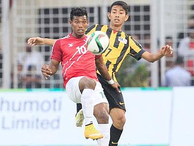 A moment from Bangladesh vs Malaysia football match on Thursday in Sylhet.