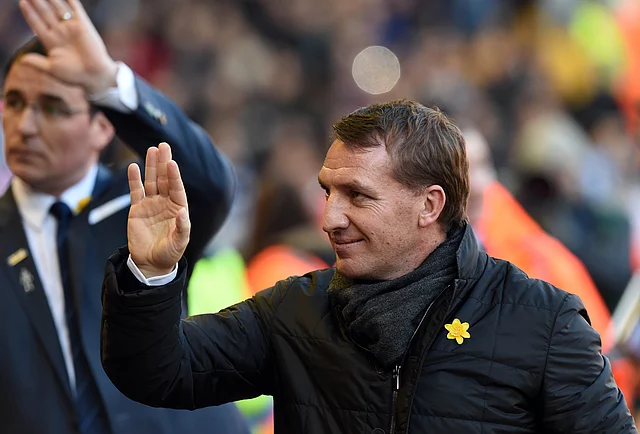 Liverpool's manager Brendan Rodgers waves as he arrives for the FA Cup quarter-final match between Liverpool and Blackburn Rovers on 8 March 2015. Photo: AFP
