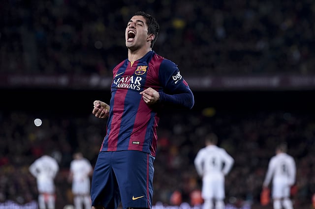 Barcelona's Uruguayan forward Luis Suarez celebrates his goal during their match against Real Madrid at the Camp Nou stadium in Barcelona on 22 March 2015. Photo: AFP