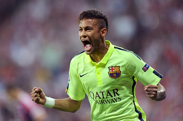 Barcelona's Brazilian forward Neymar da Silva Santos Junior celebrates scoring his first goal during the UEFA Champions League football match semi final FC Bayern Munich vs FC Barcelona in Munich on May 12, 2015. AFP