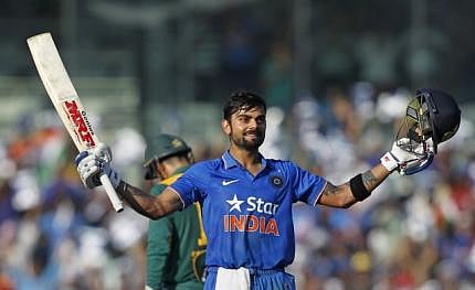 India's Virat Kohli raises his bat to celebrate scoring his century during their fourth one-day international cricket match against South Africa in Chennai, India on 22 October. Photo: Reuters