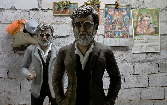 Promotional clay statues of Indian movie star Rajinikanth stand in a shed on the eve of the release of his latest movie `Kabali`, in Bangalore on 21 July. Photo: AFP