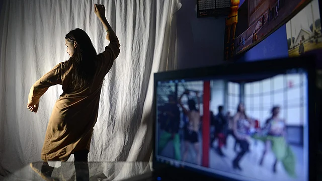 An aspiring Pakistani dancer practices her Bollywood dance moves in an academy in the red light district of Lahore. Photo: AFP