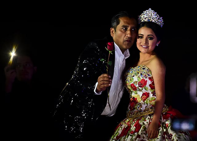 Rubi Ibarra poses during her 15th birthday celebrations in Villa Guadalupe, San Luis Potosi State, on December 26, 2016. Rubi, a small-town Mexican teen, welcomed thousands of guests for her 15th birthday party after her parents' video invitation to the milestone event went viral online.Photo:AFP
