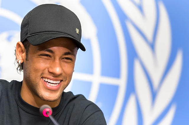 Brazilian superstar and world`s most expensive footballer Neymar smiles as he attends a press conference following an event organized by NGO Handicap International on August 15, 2017 at the Place des Nations in Geneva. AFP