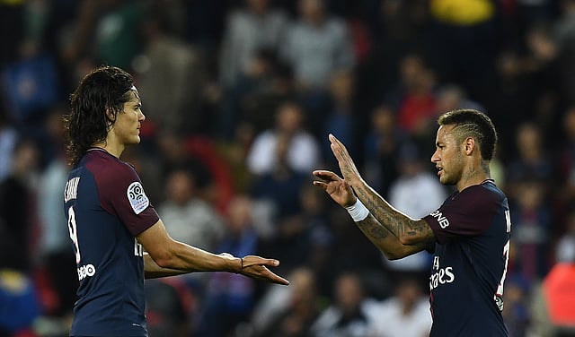 Paris Saint-Germain’s Brazilian forward Neymar ® and Paris Saint-Germain’s Uruguayan forward Edinson Cavani react during the French L1 football match between Paris Saint-Germain (PSG) and Saint-Etienne (ASSE). Photo: AFP