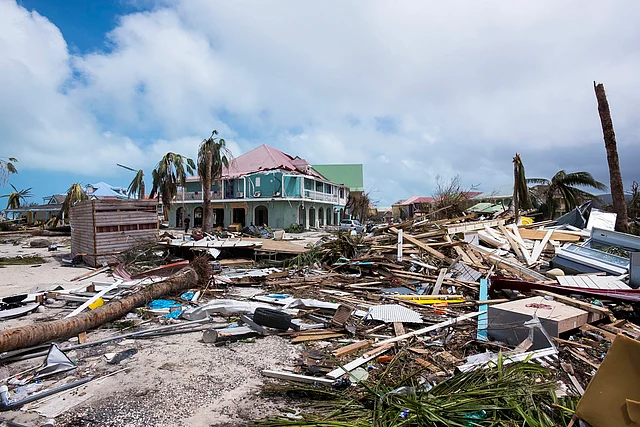 A photo taken on September 7, 2017 shows damage in Orient Bay on the French Carribean island of Saint-Martin, after the passage of Hurricane Irma. France, the Netherlands and Britain on September 7 rushed to provide water, emergency rations and rescue teams to territories in the Caribbean hit by Hurricane Irma, with aid efforts complicated by damage to local airports and harbours. AFP