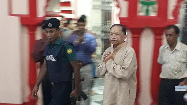Chief justice Surendra Kumar Sinha seen offering Lakshmi Puja in the capital`s Dhakeshwari Temple on Thursday afternoon.