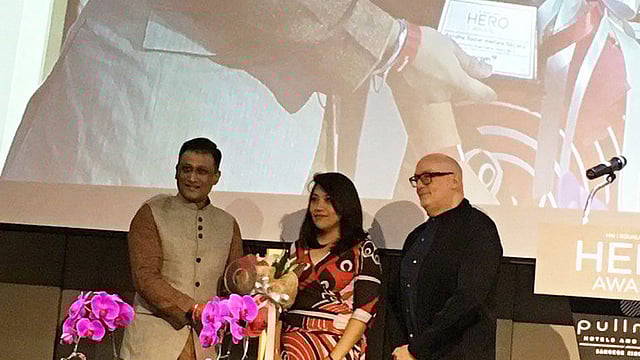 Bandhu Social Welfare Society executive director Saleh Ahmed takes the award. Photo: Collected