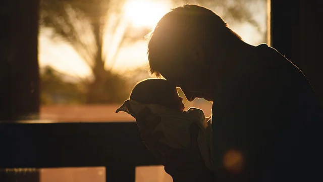 Father and baby. Photo: Collected