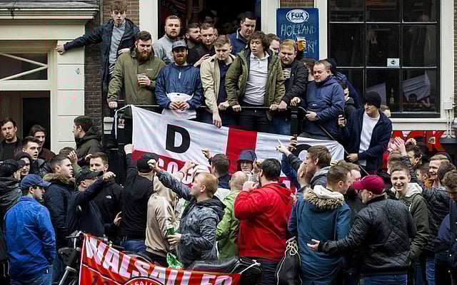 English football fans at an Amsterdam red-light district prior to the friendly football match between the Netherlands and England in Amsterdam on Friday. AFP