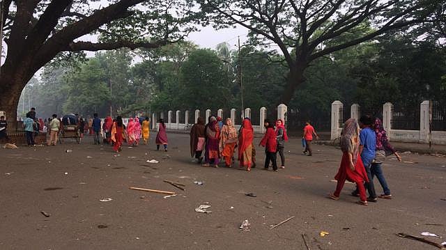 Dhaka University students return to their dorms after nightlong protest for reforms in the existing quota system in the public service. Photo: Prothom Alo