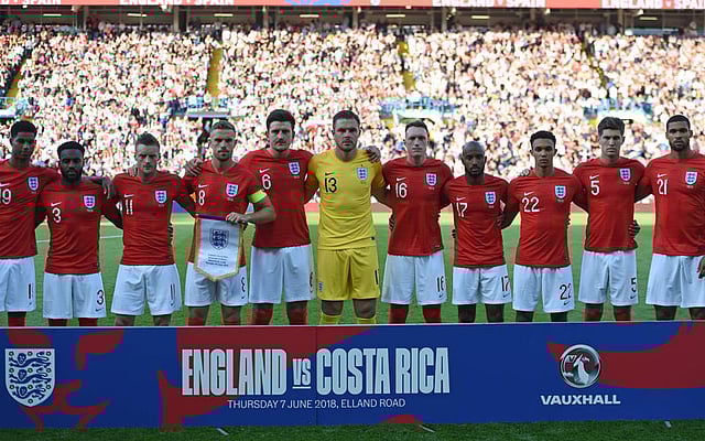 England`s players (L-R) striker Marcus Rashford, defender Danny Rose, striker Jamie Vardy, midfielder Jordan Henderson, defender Harry Maguire, goalkeeper Jack Butland, defender Phil Jones, midfielder Fabian Delph, defender Trent Alexander-Arnold, defender John Stones and midfielder Ruben Loftus-Cheek line up for a photograph ahead of the International friendly football match between England and Costa Rica at Elland Road on 7 June 2018. England won the game 2-0. AFP