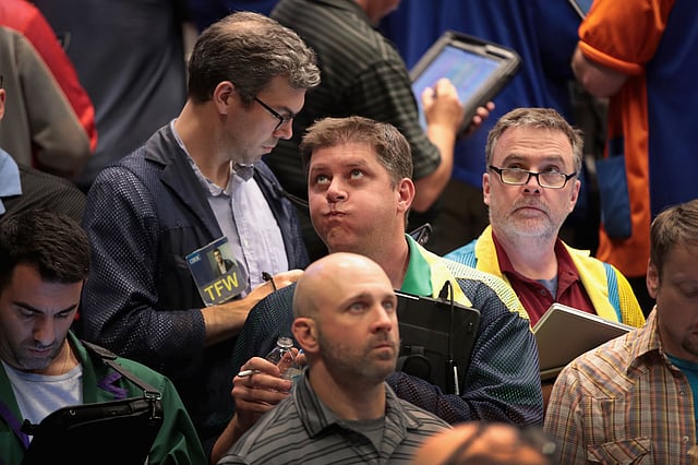 Traders monitor the markets in the S&P options pit at the Cboe Global Markets exchange (previously referred to as CBOE Holdings) on 25 June 2018 in Chicago, Illinois. Photo: AFP