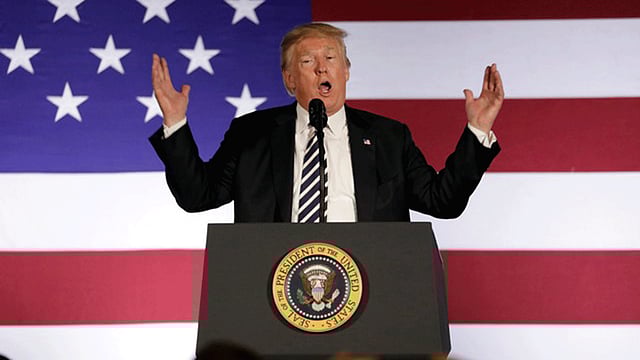 US president Donald Trump speaks at a campaign fundraising luncheon for Rep. Ted Budd (R-NC) and GOP congressional candidate Mark Harris at Carmel Country Club in Charlotte, NC, US on 31 August 2018. Photo: Reuters