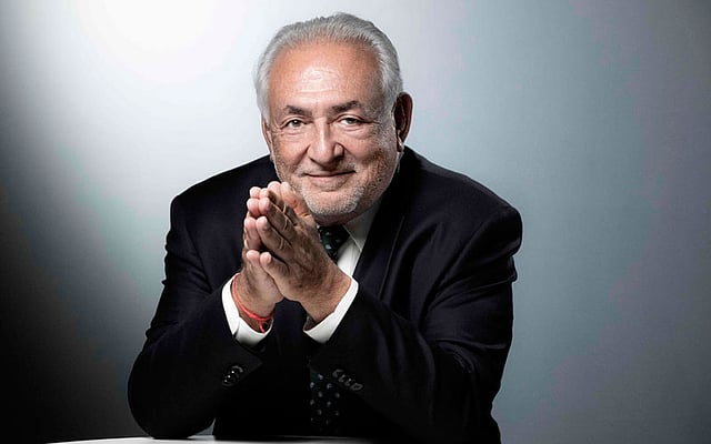 Former French economy minister and former managing director of the International Monetary Fund (IMF) Dominique Strauss-Kahn poses during a photo session in Paris on September 6, 2018. AFP