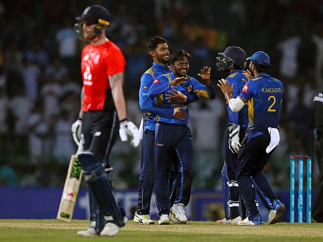 Sri Lanka`s Akila Dananjaya (C) celebrates with his teammates after taking the wicket of England`s Ben Stokes (L) in the fifth One-Day International at Colombo, Sri Lanka on 23 October 2018. Photo: Reuters