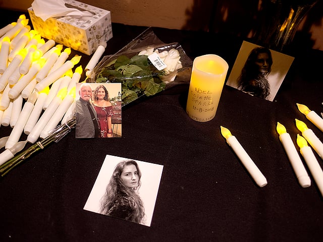 Pictures of Noel Sparks are seen during a candlelight vigil in Thousand Oaks , Calif., Thursday, Nov. 8, 2018. A gunman opened fire Wednesday evening inside a country music bar, killing multiple people. Photo: AP