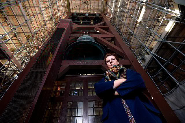 Polish carillon player Malgosia Fiebig poses for a picture below the bells of the Dom Tower (Domtoren) in Utrecht, the Netherlands` tallest church tower, on 8 November 2018. Photo: AFP