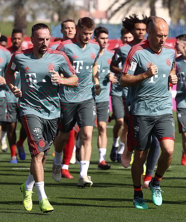 FC Bayern Munich`s French midfielder Franck Ribery (L) and Dutch midfielder Arjen Robben (R) take part with other teammates in a training session during their winter training camp at the Aspire Academy for Sports Excellence in the Qatari capital Doha on 5 January 2019. Photo: AFP