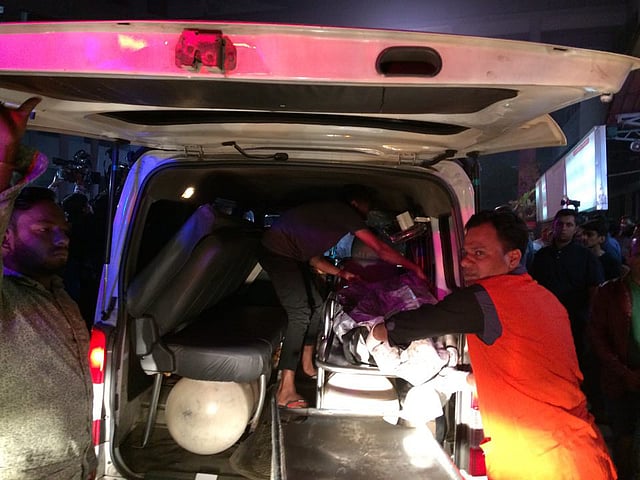 A body burnt in the fire is being taken away from the spot. Photo: Prothom Alo