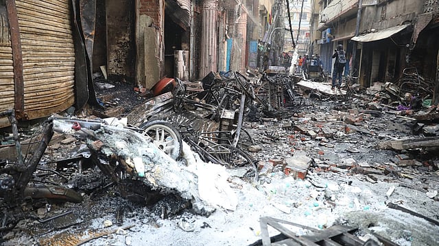 A number of vehicles are burnt down in the fire that broke out in a five-story building in Chawkbazar area of Old Dhaka on 20 February. Photo: Prothom Alo