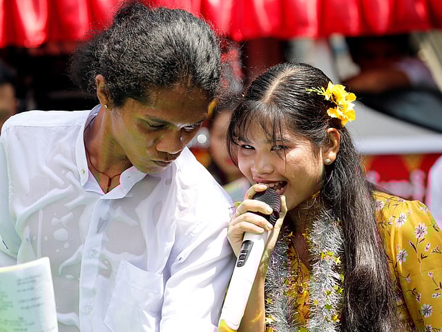 Students from Dagon University perform Burmese traditional slam poetry or thangyat during Burmese New Year in Yangon, Myanmar, on 13 April 2019. Photo: Reuters