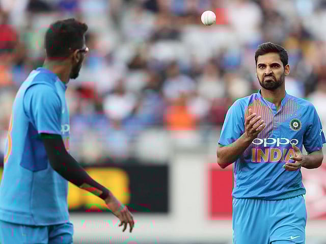 India`s Bhuvneshwar Kumar (R). Photo: AFP