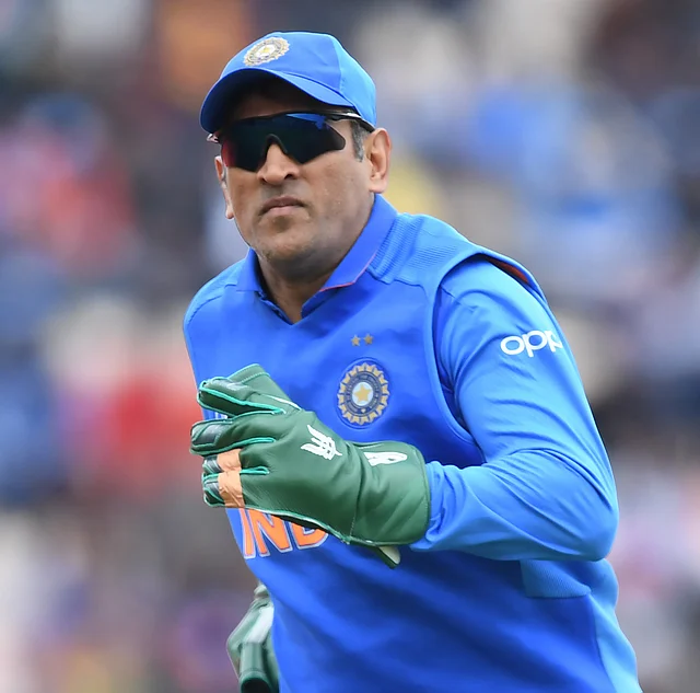 Dhoni Gloves CAP::::India`s Mahendra Singh Dhoni fields during the 2019 Cricket World Cup group stage match between South Africa and India at the Rose Bowl in Southampton, southern England, on 5 June, 2019. Photo: AFP