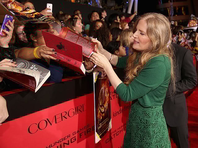In this file photo taken on 18 November, 2013 Author Suzanne Collins attends premiere of Lionsgate`s `The Hunger Games: Catching Fire` - Red Carpet at Nokia Theatre LA Live in Los Angeles. Photo: AFP